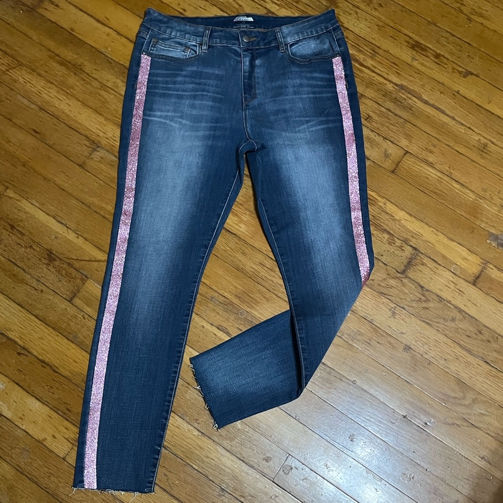Project runway skinny jeans with pink sparkle strip downsides